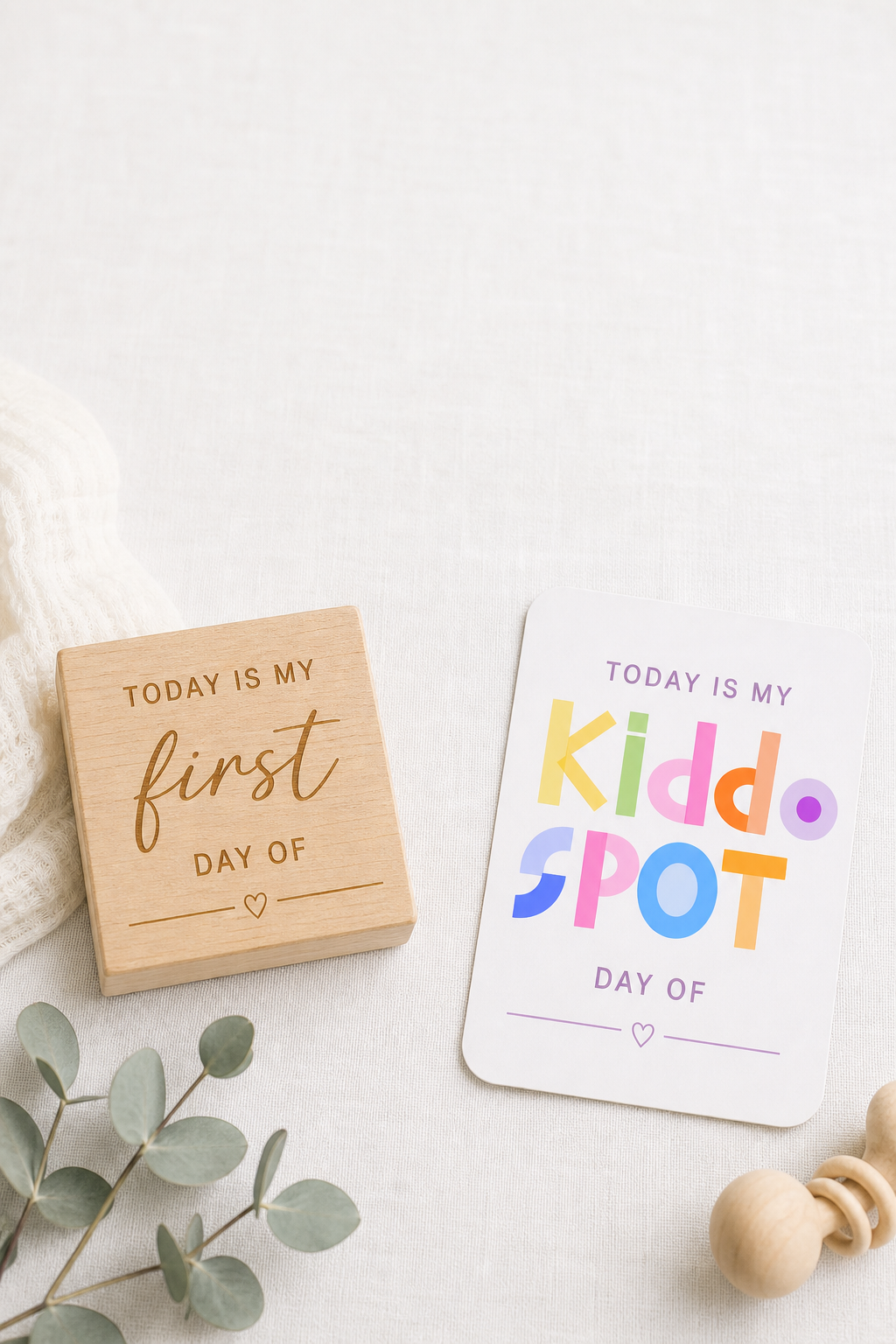 Wooden milestone block vs paper milestone card comparison flat lay — Kiddospot