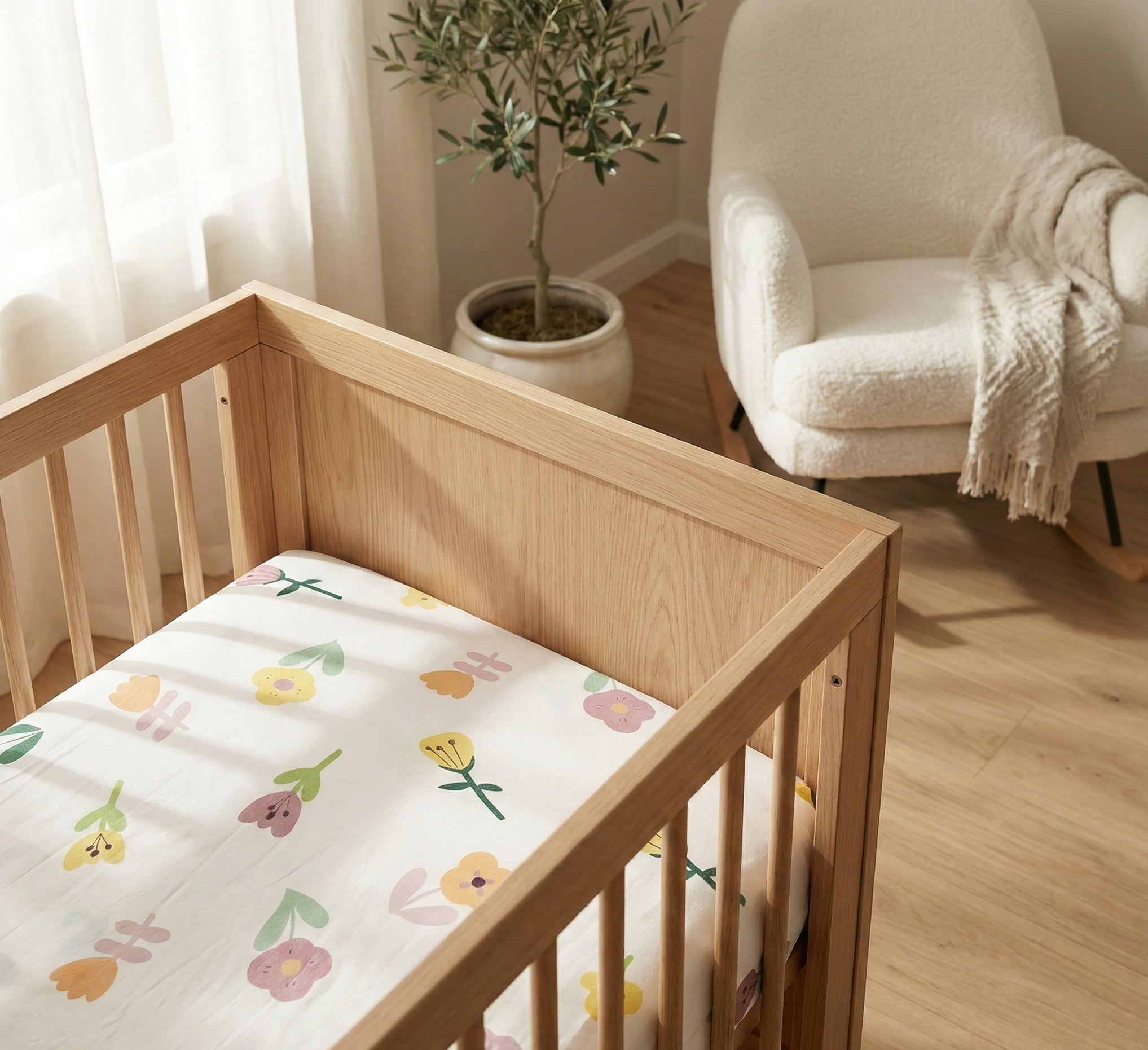 Kiddospot flower design organic cot fitted sheet on wooden crib