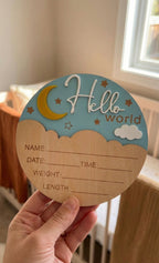 Kiddospot wooden baby announcement sign held in hand — Hello World newborn photo prop