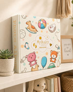 Kiddospot baby memory book standing upright on nursery shelf — hardbound keepsake journal birth to age 5 baby shower gift