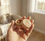 Kiddospot wooden tooth fairy box held in hand — solid natural wood keepsake