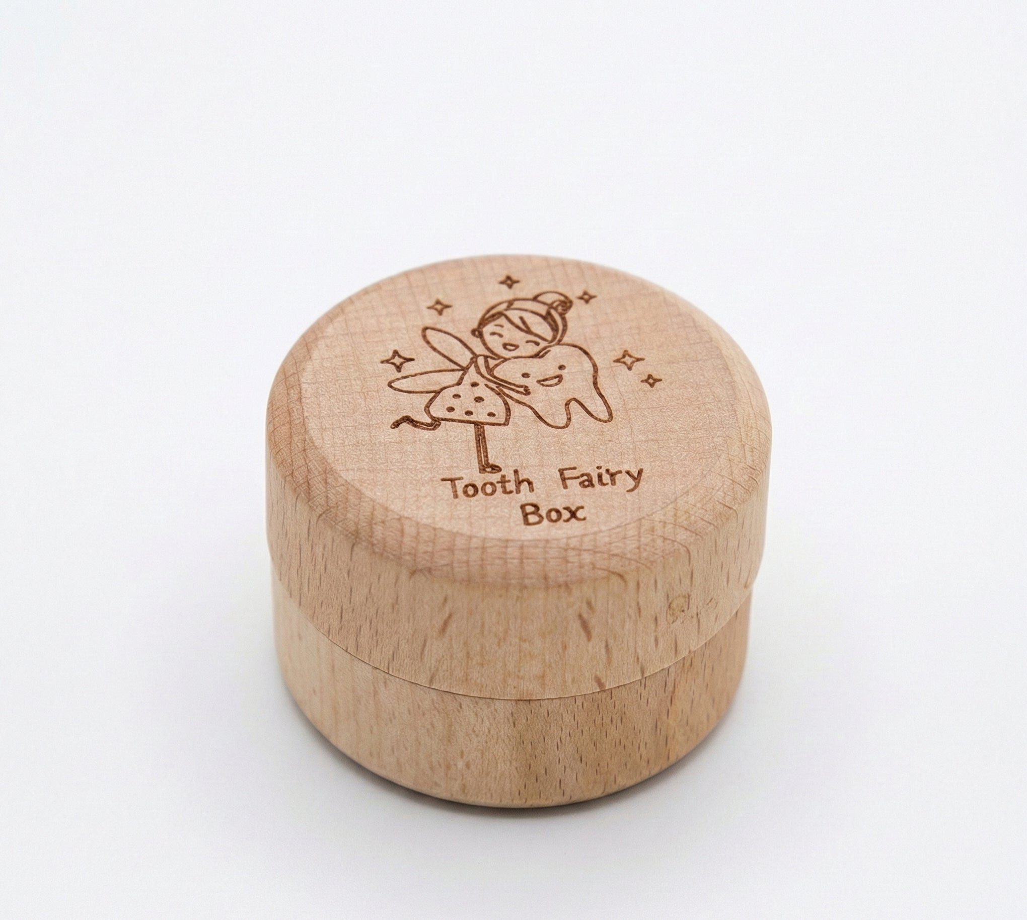 Wooden tooth fairy box with engraved design on a white background
