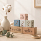 Kiddospot baby blue milestone blocks  with decorative elements on a neutral background