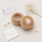 Kiddospot Deluxe Wooden Tooth Fairy Box — solid beechwood cylindrical box with a tooth-shaped design on a light background