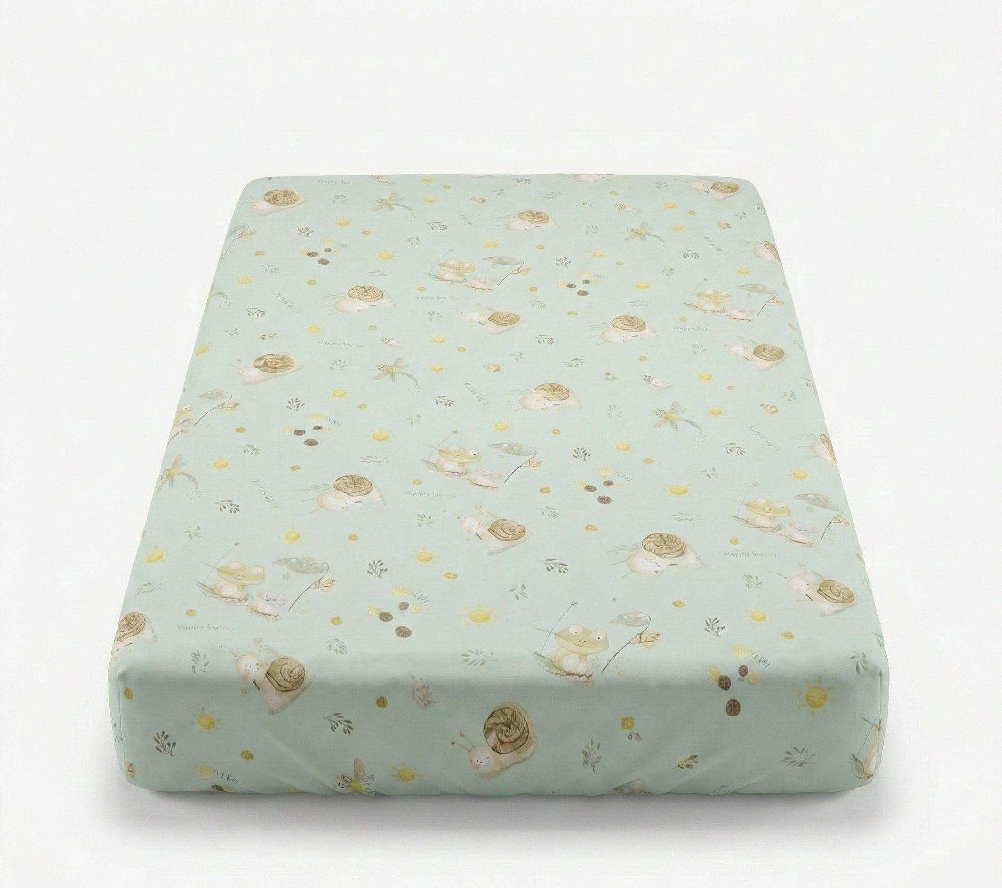 Floral-patterned mattress cover on a light green background