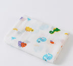 Floral patterned fabric with colorful fish designs on a white background