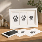 Kiddospot pet paw print keepsake frame displayed on wooden shelf with pet figurine