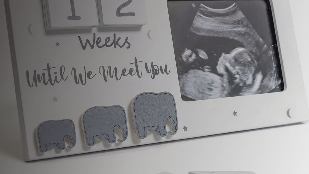 Kiddospot Wooden Baby Reveal Calendar — laser-cut premium wood pregnancy announcement prop and due date countdown keepsake. 15cm engraved disc, perfect for maternity photos, social media announcements, and baby shower reveals. Doubles as a nursery keepsake. AS/NZS ISO 8124 certified. kiddospot.com