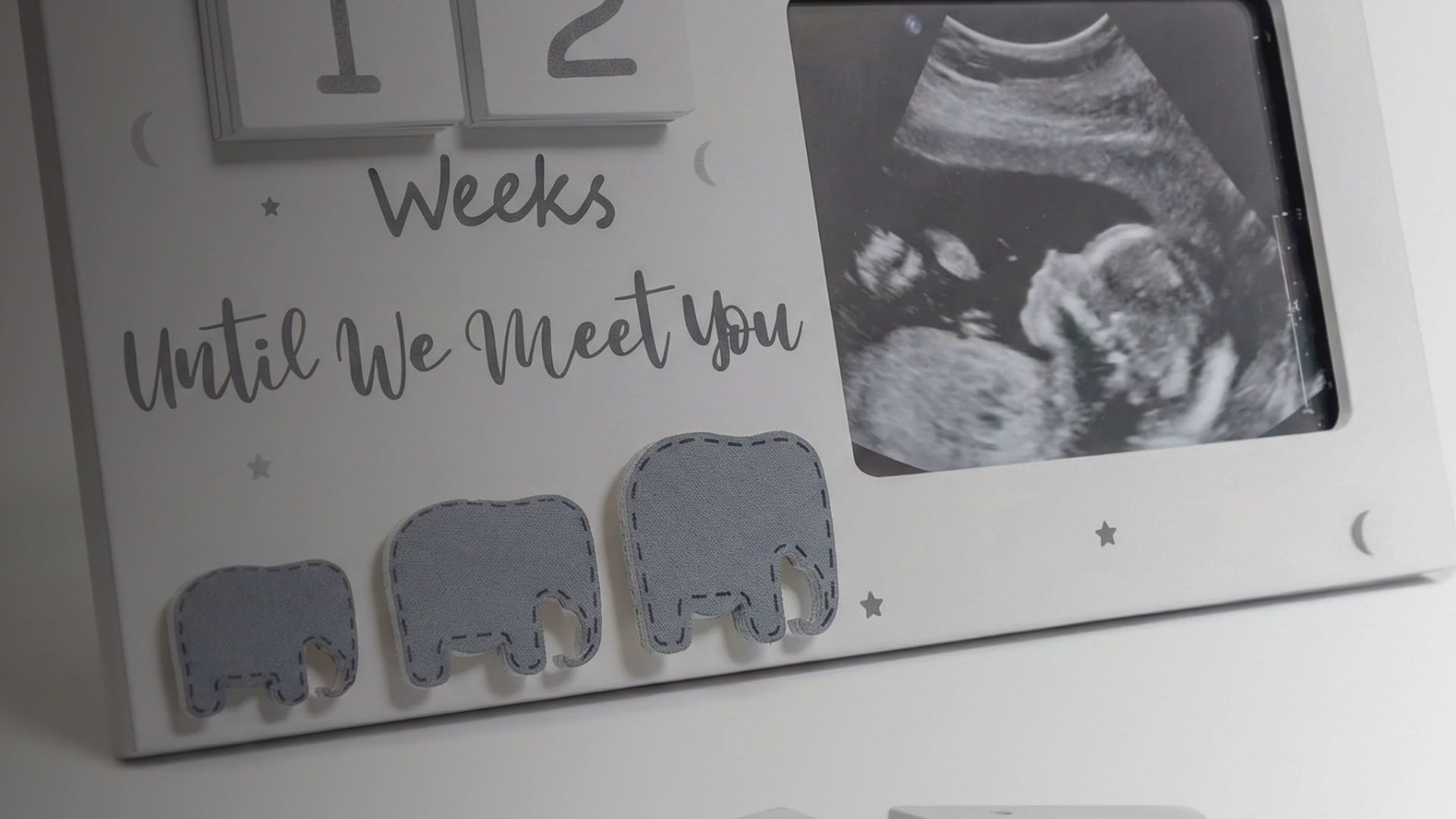 Kiddospot Wooden Baby Reveal Calendar — laser-cut premium wood pregnancy announcement prop and due date countdown keepsake. 15cm engraved disc, perfect for maternity photos, social media announcements, and baby shower reveals. Doubles as a nursery keepsake. AS/NZS ISO 8124 certified. kiddospot.com