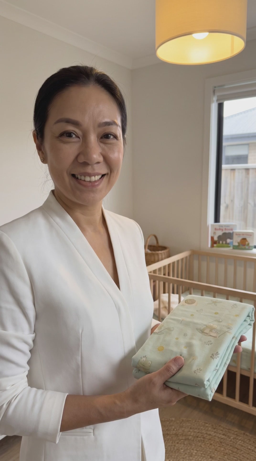 Kiddospot's organic cot fitted sheet with frog & snail pattern reviewed by a parent.