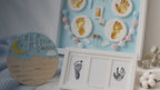 Kiddospot Newborn Keepsake Bundle Blue — includes 28x33cm blue baby handprint and footprint shadowbox frame with hanging hardware, newborn mess-free inkless hand and footprint kit safe for newborn skin from day one, and wooden Hello World birth announcement sign. Complete newborn keepsake gift set, ISO 8124 certified, arrives gift-boxed. Free AU shipping. kiddospot.com