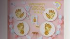 Kiddospot Pink Baby Handprint and Footprint Frame — complete 28x33cm display-ready inkless clay kit with hanging hardware included. 100% mess-free, safe for newborn skin from day one. Warm, elegant pink frame suited to floral, blush, Scandi, and warm-toned nurseries. Perfect baby shower gift for girls. ISO 8124 certified. Free AU shipping. kiddospot.com
